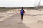 Weynay Ghebresilasie battles through a sand storm on his way to winning the Sand Dancer, South Shields.